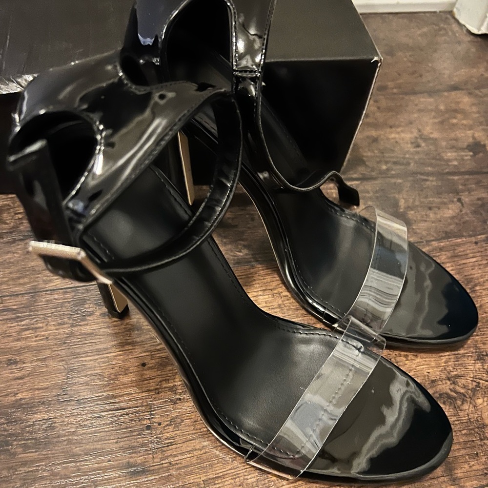 Brand new Black strappy heals with clear strap SZ 8.5